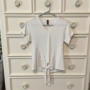 Francesca’s white v-neck